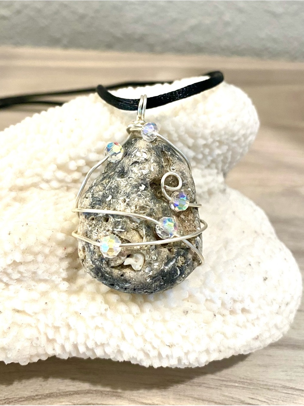 8. Silver Wire-Wrapped Sanibel Hag stone Pendant with Iridescent Beads